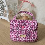 Косметичка на кнопке с ручкой маленькая