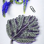 Ажурная брошь — лист квиллинг-графика.