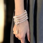 Многорядный браслет из розового кварца и жемчуга