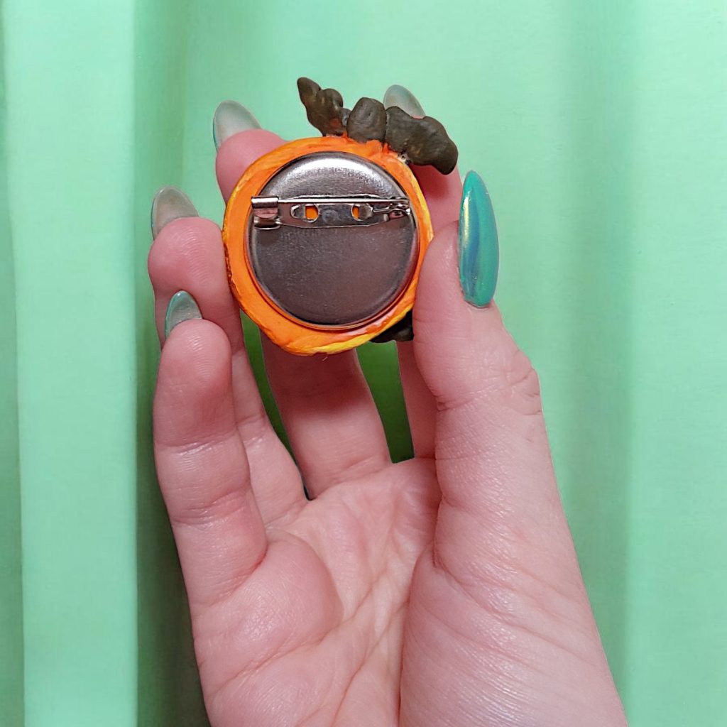 Брошь тыква с глазками