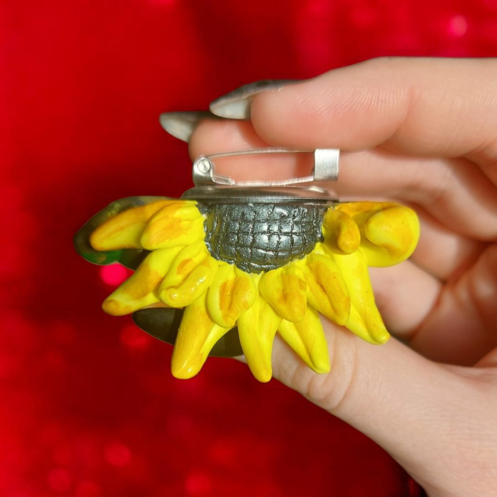 Брошь дух подсолнуха с глазками