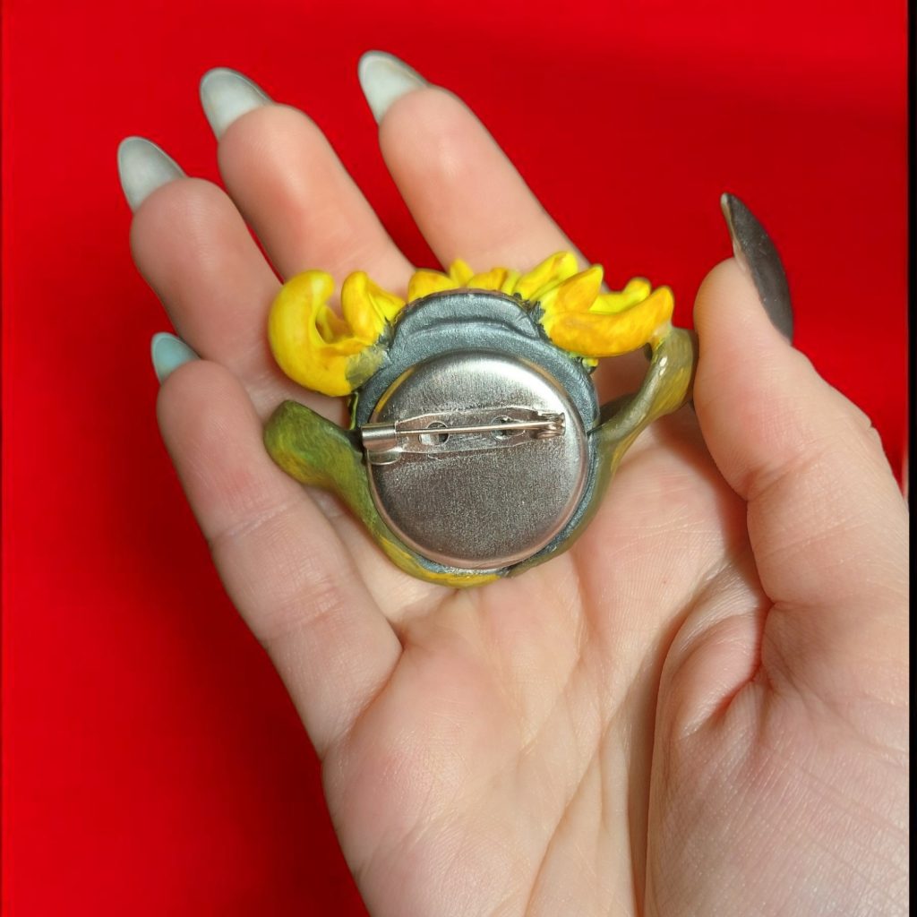 Брошь дух подсолнуха с глазками